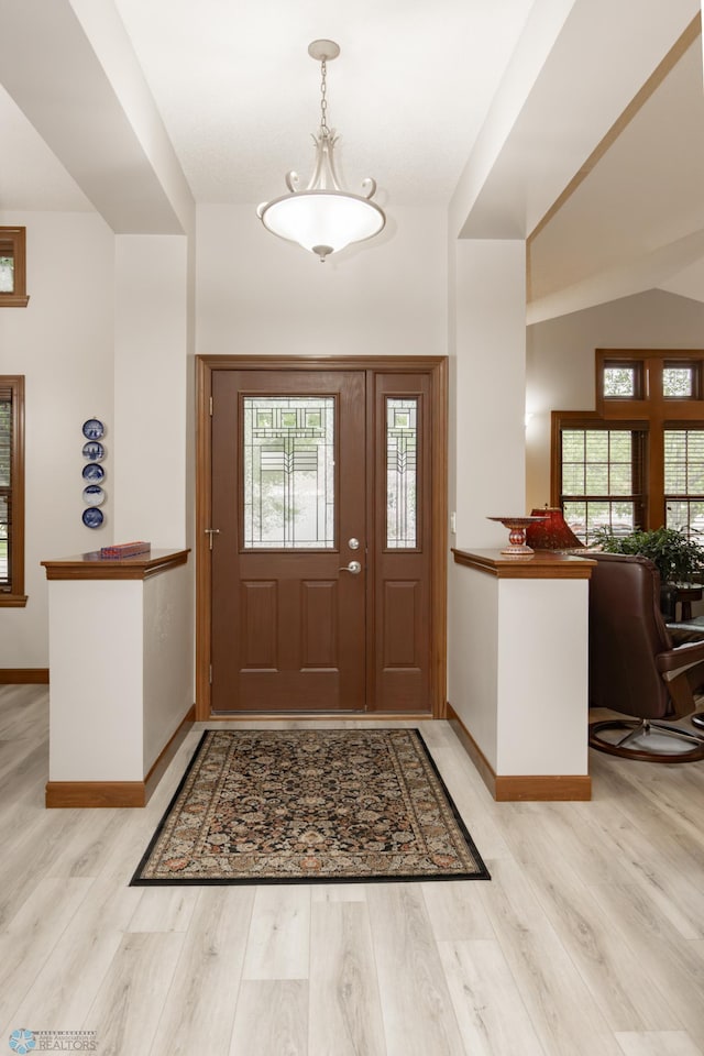 1365 Highpointe Dr N, Fargo, ND 58102 - entrance foyer with light wood finished floors and baseboards