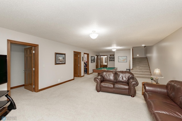 1365 Highpointe Dr N, Fargo, ND 58102 - living room featuring billiards table, light carpet, stairway, and a textured ceiling