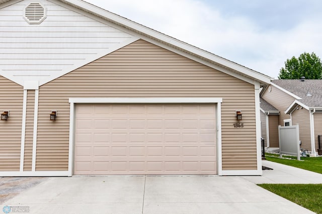 1365 Highpointe Dr N, Fargo, ND 58102 - garage with concrete driveway
