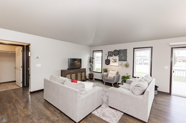 6675 57th Ave S, Fargo, ND 58104 - living room featuring dark wood-style floors and vaulted ceiling