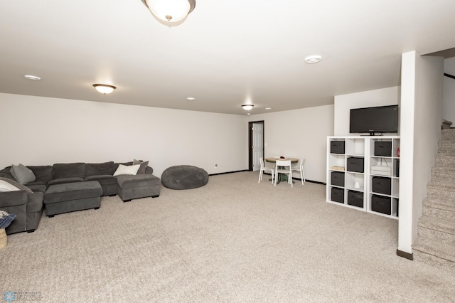 6675 57th Ave S, Fargo, ND 58104 - living area with carpet floors and stairs
