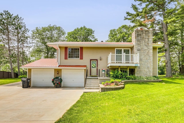 10275 Park Cir, Pine City, MN 55063 - view of front of home featuring a front yard, driveway, a chimney, and metal roof