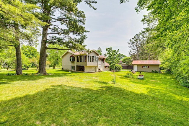 10275 Park Cir, Pine City, MN 55063 - view of green lawn with a sunroom