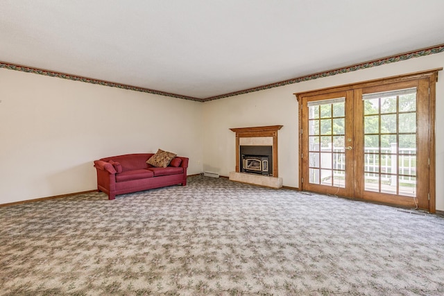 10275 Park Cir, Pine City, MN 55063 - unfurnished room with carpet floors, baseboards, a fireplace with raised hearth, and ornamental molding