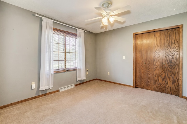 10275 Park Cir, Pine City, MN 55063 - unfurnished bedroom with carpet floors, a closet, baseboards, and a ceiling fan