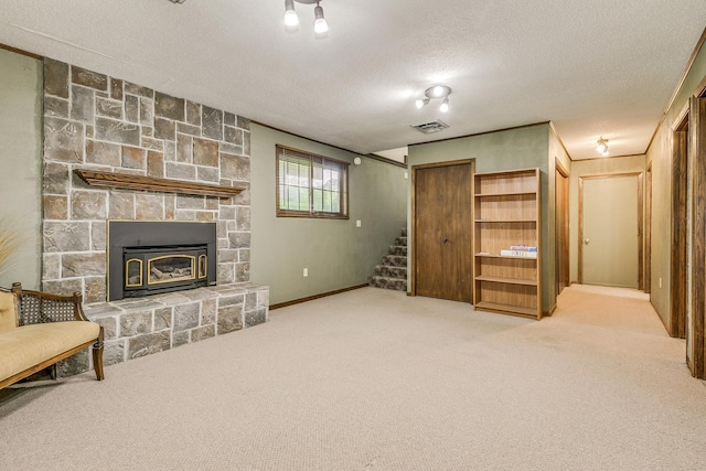 10275 Park Cir, Pine City, MN 55063 - unfurnished living room featuring stairway, a textured ceiling, carpet floors, and baseboards
