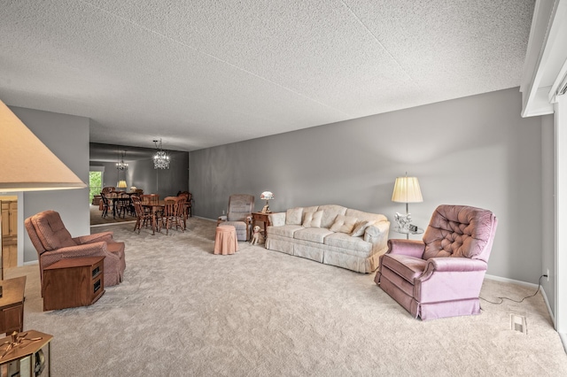 2455 Londin Ln E Unit 216, Maplewood, MN 55119 - carpeted living room with a chandelier and a textured ceiling