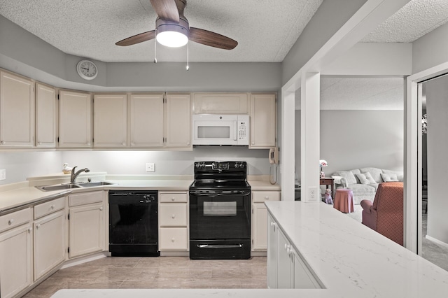 2455 Londin Ln E Unit 216, Maplewood, MN 55119 - kitchen featuring black appliances, cream cabinetry, ceiling fan, and a textured ceiling