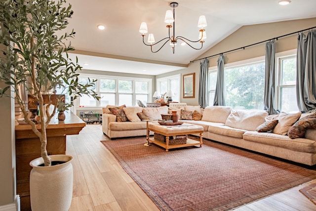 72 Mill St, Winona, MN 55987 - living area with vaulted ceiling, a chandelier, light wood-style floors, and recessed lighting
