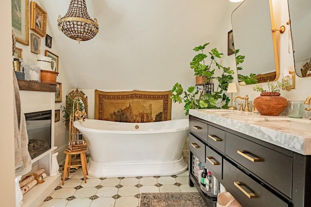 72 Mill St, Winona, MN 55987 - bathroom featuring double vanity and a freestanding bath