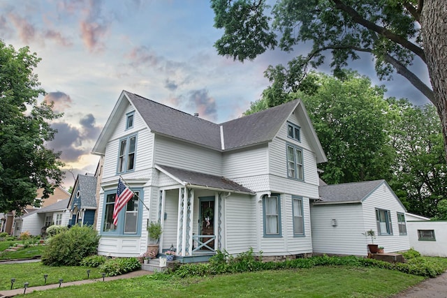 72 Mill St, Winona, MN 55987 - victorian house with a yard and a shingled roof