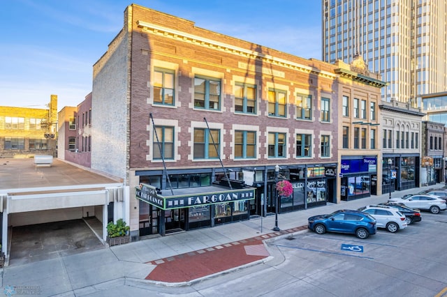 319 Broadway N Unit 207, Fargo, ND 58102 - view of commercial property featuring uncovered parking