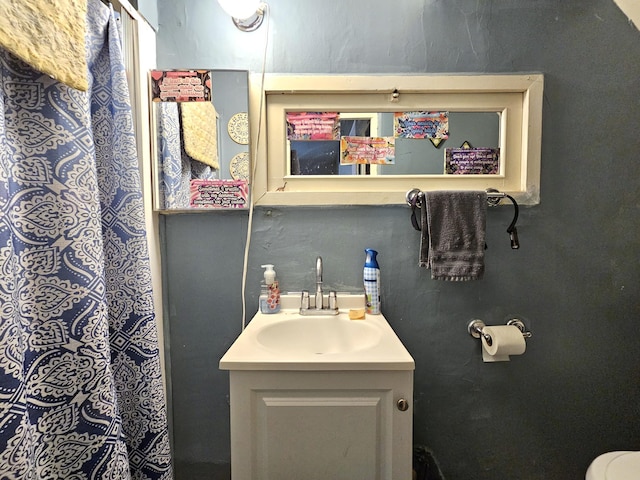 214 Vasa Ave, Fergus Falls, MN 56537 - full bathroom featuring vanity, toilet, and a shower with shower curtain