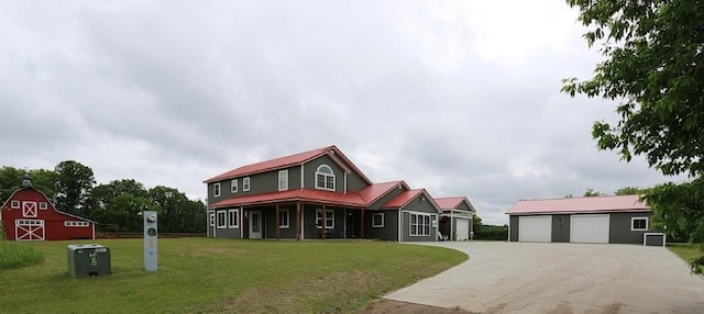 39192 460th Ave, Perham, MN 56573 - view of front of house featuring an outbuilding, a front yard, a barn, and a garage