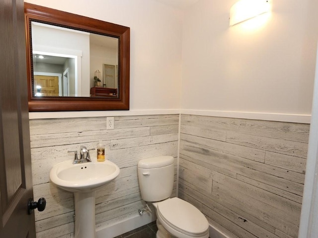 39192 460th Ave, Perham, MN 56573 - half bathroom with toilet, wainscoting, and wood walls