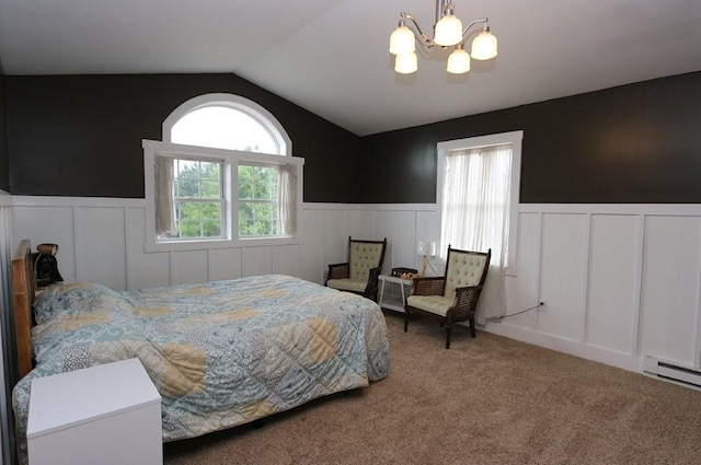 39192 460th Ave, Perham, MN 56573 - carpeted bedroom with a wainscoted wall, a chandelier, lofted ceiling, baseboard heating, and a decorative wall
