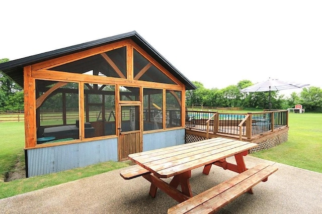 39192 460th Ave, Perham, MN 56573 - surrounding community with outdoor dining space, a lawn, and a patio area