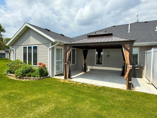1423 Fairview Ln, Little Falls, MN 56345 - rear view of property with a patio area, a lawn, and a gazebo