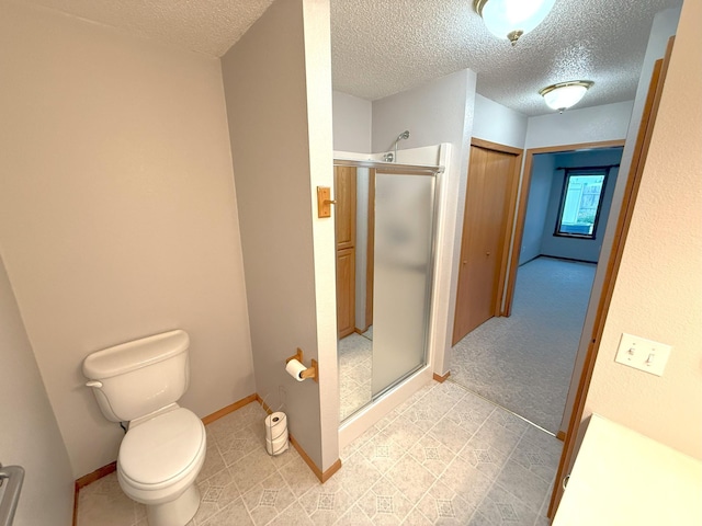 1423 Fairview Ln, Little Falls, MN 56345 - bathroom with a shower stall and a textured ceiling