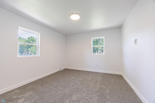 1814 5th St N, Fargo, ND 58102 - carpeted spare room with baseboards