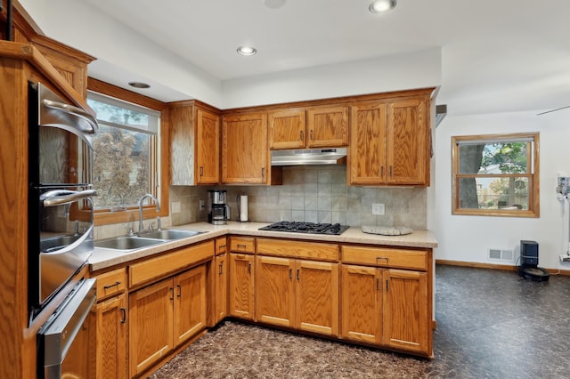 1412 10th Ave W, Shakopee, MN 55379 - kitchen featuring under cabinet range hood, plenty of natural light, a sink, black gas stovetop, and recessed lighting