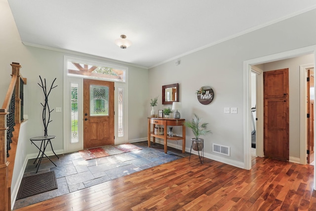 13478 Clearwater Cir, Rogers, MN 55374 - entryway with wood finished floors, ornamental molding, and stairs
