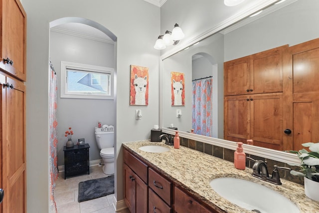 13478 Clearwater Cir, Rogers, MN 55374 - bathroom featuring crown molding, double vanity, tile patterned floors, and a shower with curtain