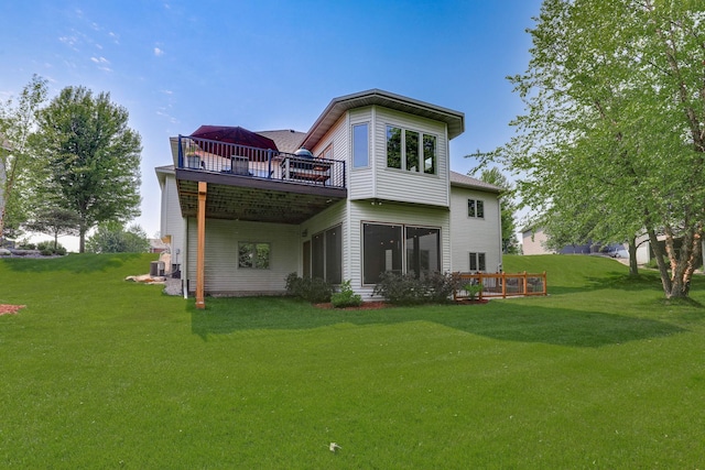 13478 Clearwater Cir, Rogers, MN 55374 - rear view of property featuring a deck and a lawn