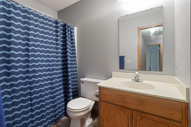 1580 9th Street Cir SE, Forest Lake, MN 55025 - bathroom featuring toilet, vanity, a textured ceiling, and curtained shower