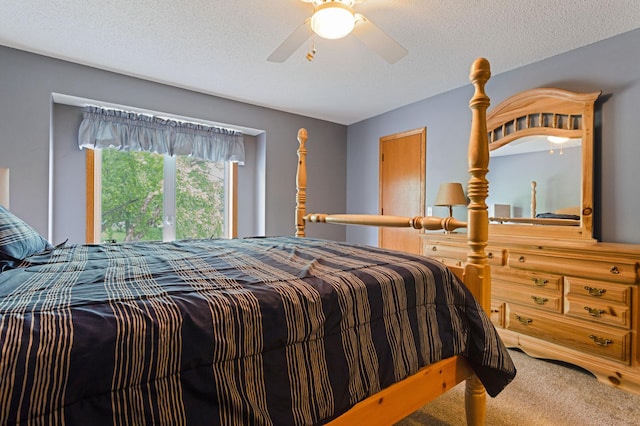 1580 9th Street Cir SE, Forest Lake, MN 55025 - carpeted bedroom featuring ceiling fan and a textured ceiling
