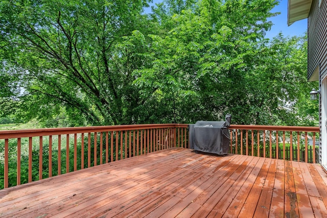 1580 9th Street Cir SE, Forest Lake, MN 55025 - wooden terrace with a grill