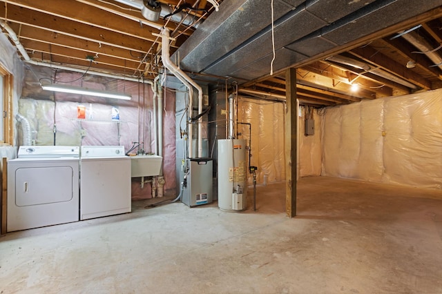 1580 9th Street Cir SE, Forest Lake, MN 55025 - unfinished below grade area with washer and dryer, gas water heater, heating unit, a sink, and electric panel