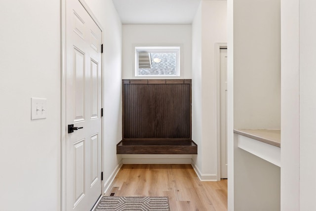 5175 White Star Ln, Woodbury, MN 55129 - mudroom featuring light wood finished floors and baseboards