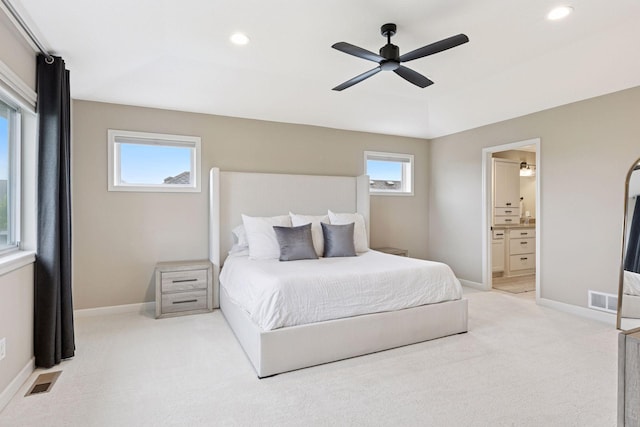 5175 White Star Ln, Woodbury, MN 55129 - bedroom featuring light colored carpet, ensuite bathroom, recessed lighting, baseboards, and ceiling fan