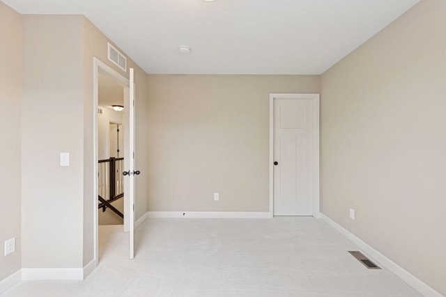 5175 White Star Ln, Woodbury, MN 55129 - unfurnished bedroom featuring light carpet and baseboards