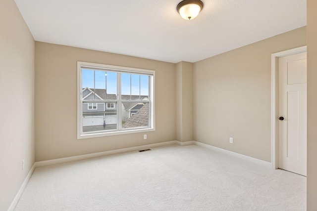 5175 White Star Ln, Woodbury, MN 55129 - carpeted empty room featuring baseboards