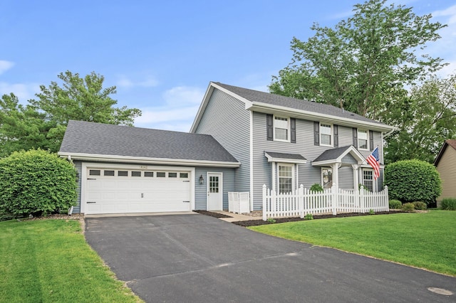 4142 Joppa Cir, Savage, MN 55378 - view of front facade with asphalt driveway, an attached garage, and a shingled roof