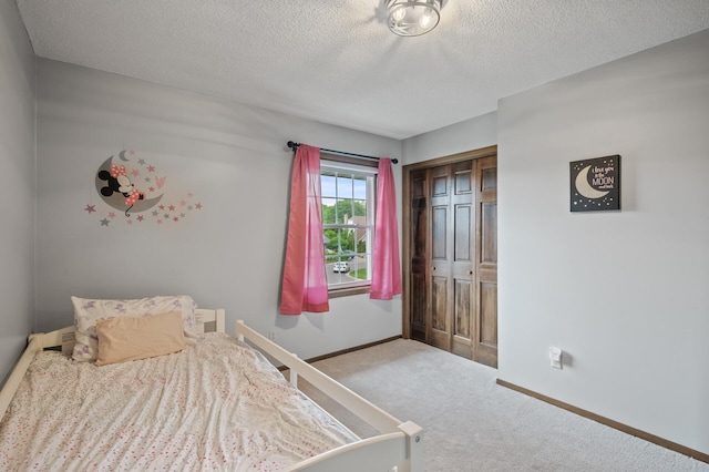 4142 Joppa Cir, Savage, MN 55378 - carpeted bedroom featuring a textured ceiling, baseboards, and a closet