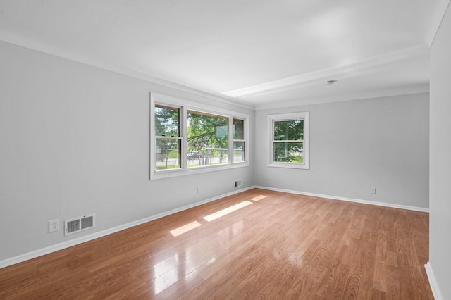 2125 White Bear Ave N, Maplewood, MN 55109 - empty room with light wood finished floors and baseboards