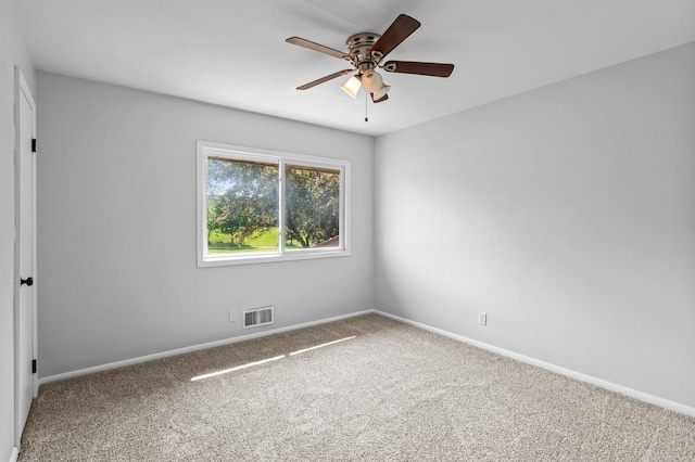 2125 White Bear Ave N, Maplewood, MN 55109 - carpeted spare room featuring ceiling fan and baseboards