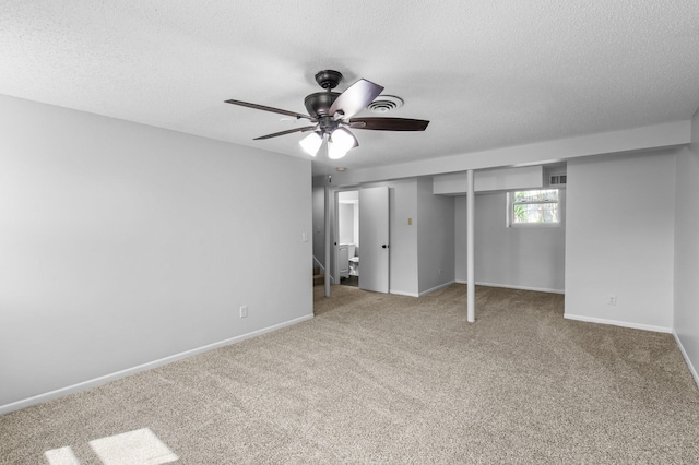 2125 White Bear Ave N, Maplewood, MN 55109 - unfurnished bedroom with a textured ceiling, carpet flooring, baseboards, a closet, and ceiling fan