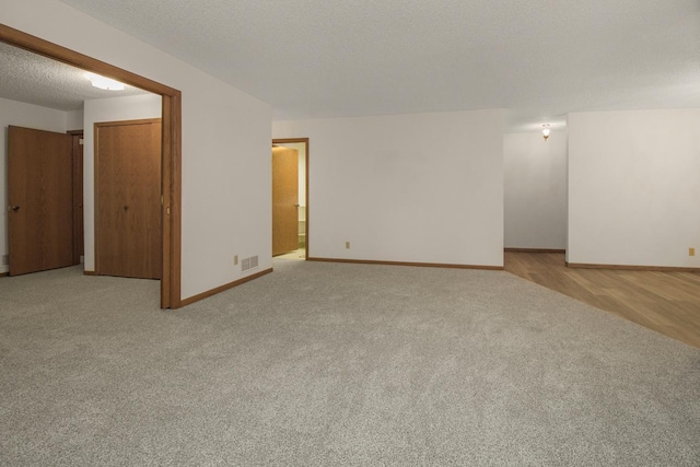 2 Crusader Ave E Unit A, West Saint Paul, MN 55118 - unfurnished room featuring light colored carpet and baseboards