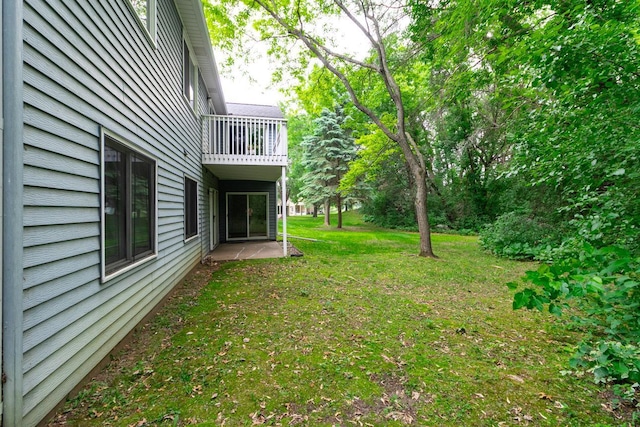 2 Crusader Ave E Unit A, West Saint Paul, MN 55118 - view of green lawn featuring a balcony and a patio area