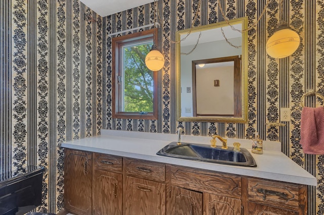 37875 600th Ave, Eden Valley, MN 55329 - bathroom with wallpapered walls and vanity