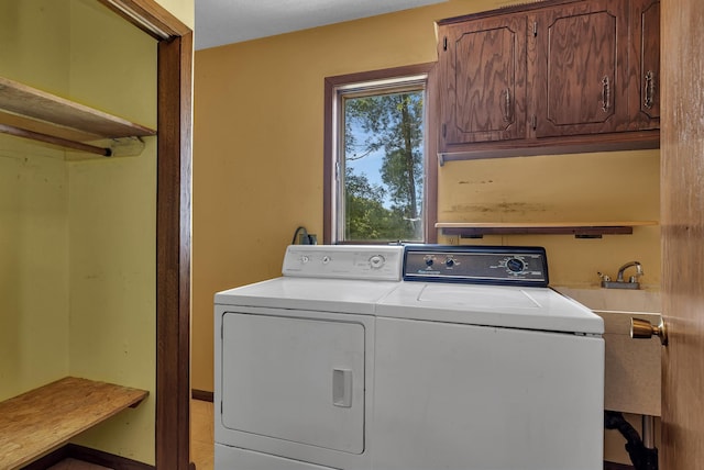 37875 600th Ave, Eden Valley, MN 55329 - laundry area with cabinet space and washer and clothes dryer