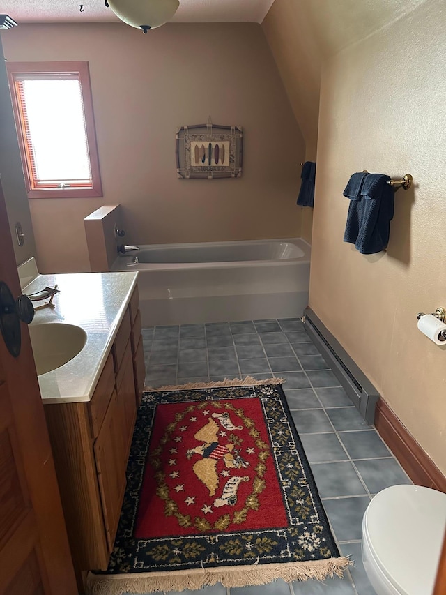 70 Lakeview Dr, Slayton, MN 56172 - bathroom with toilet, a garden tub, vanity, and baseboards