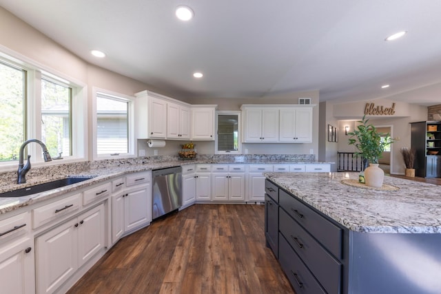 25397 Island View Dr, Cohasset, MN 55721 - kitchen with dishwasher, a sink, white cabinets, dark wood-style floors, and recessed lighting