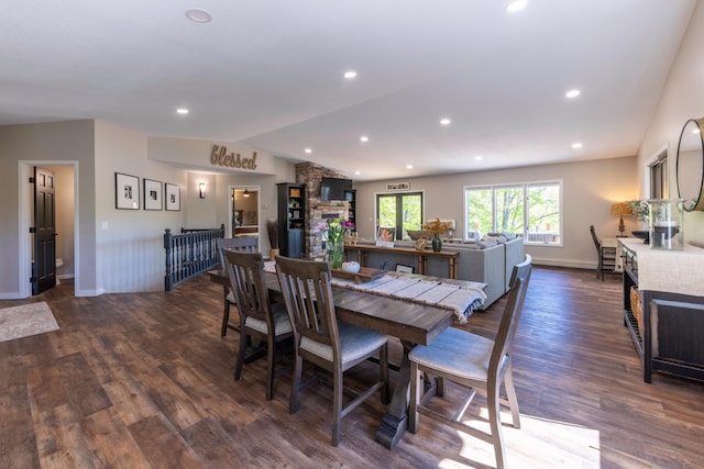 25397 Island View Dr, Cohasset, MN 55721 - dining area featuring lofted ceiling, dark wood-type flooring, baseboards, and recessed lighting