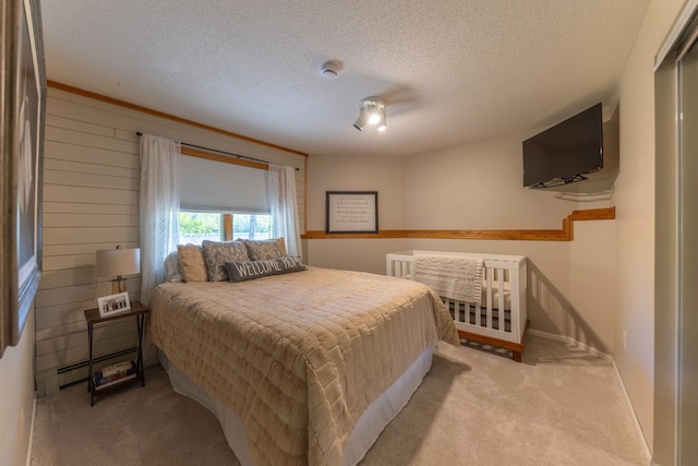 25397 Island View Dr, Cohasset, MN 55721 - carpeted bedroom featuring a textured ceiling and baseboards