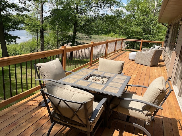 25397 Island View Dr, Cohasset, MN 55721 - wooden deck featuring a fire pit and a water view